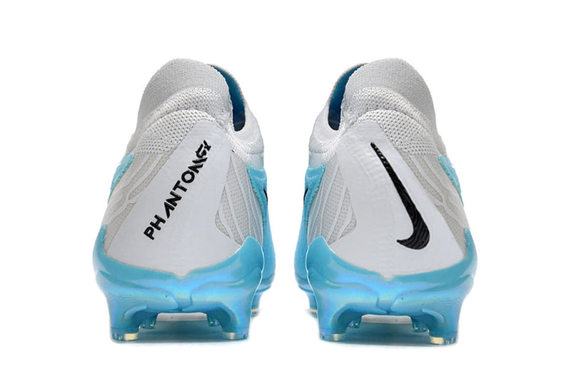 Chuteira Nike Phantom GX Low Elite FG Campo