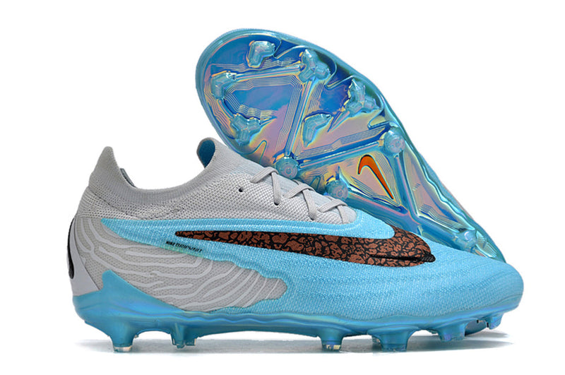 Chuteira Nike Phantom GX Low Elite FG Campo